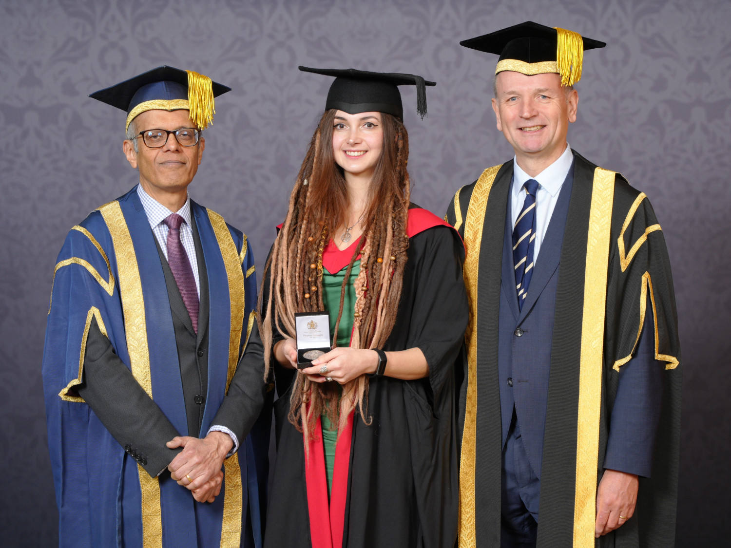 Receiving the Professor Anthony Mellows Medal from Prof. Ajay Shah and Lord Simon Stevens.